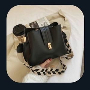 Ivy and Taylor Purse in style The Jackie